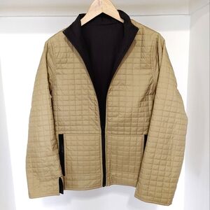Signature by Spanner | womans reversible jacket tan quilted & black